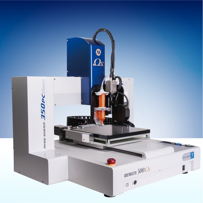 High-precision desktop dispenser applying adhesive in a controlled pattern