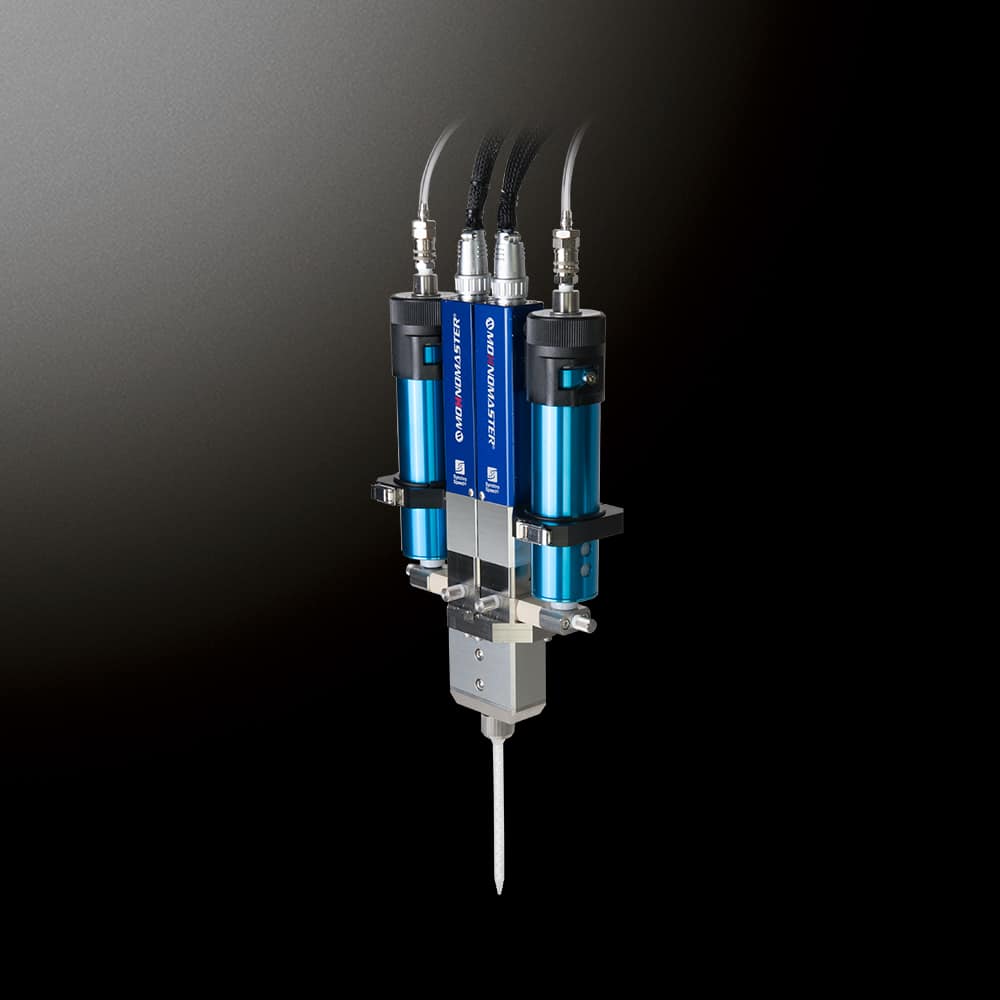 Two-material dispenser DUAL MOHNOMASTER using a progressing cavity pump for precise two-liquid potting and high-speed dispensing.